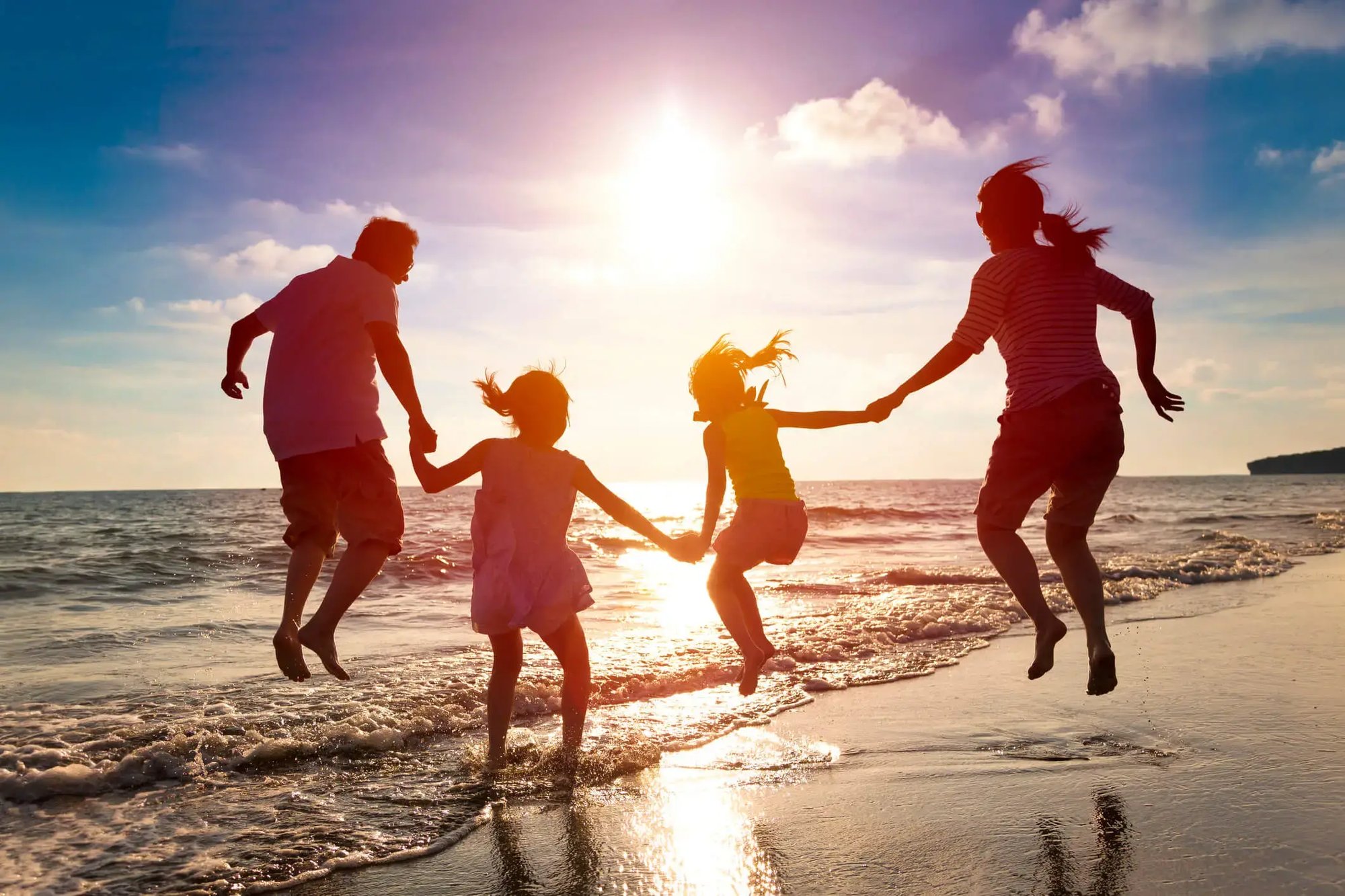 iStock-478165660-family-jumping